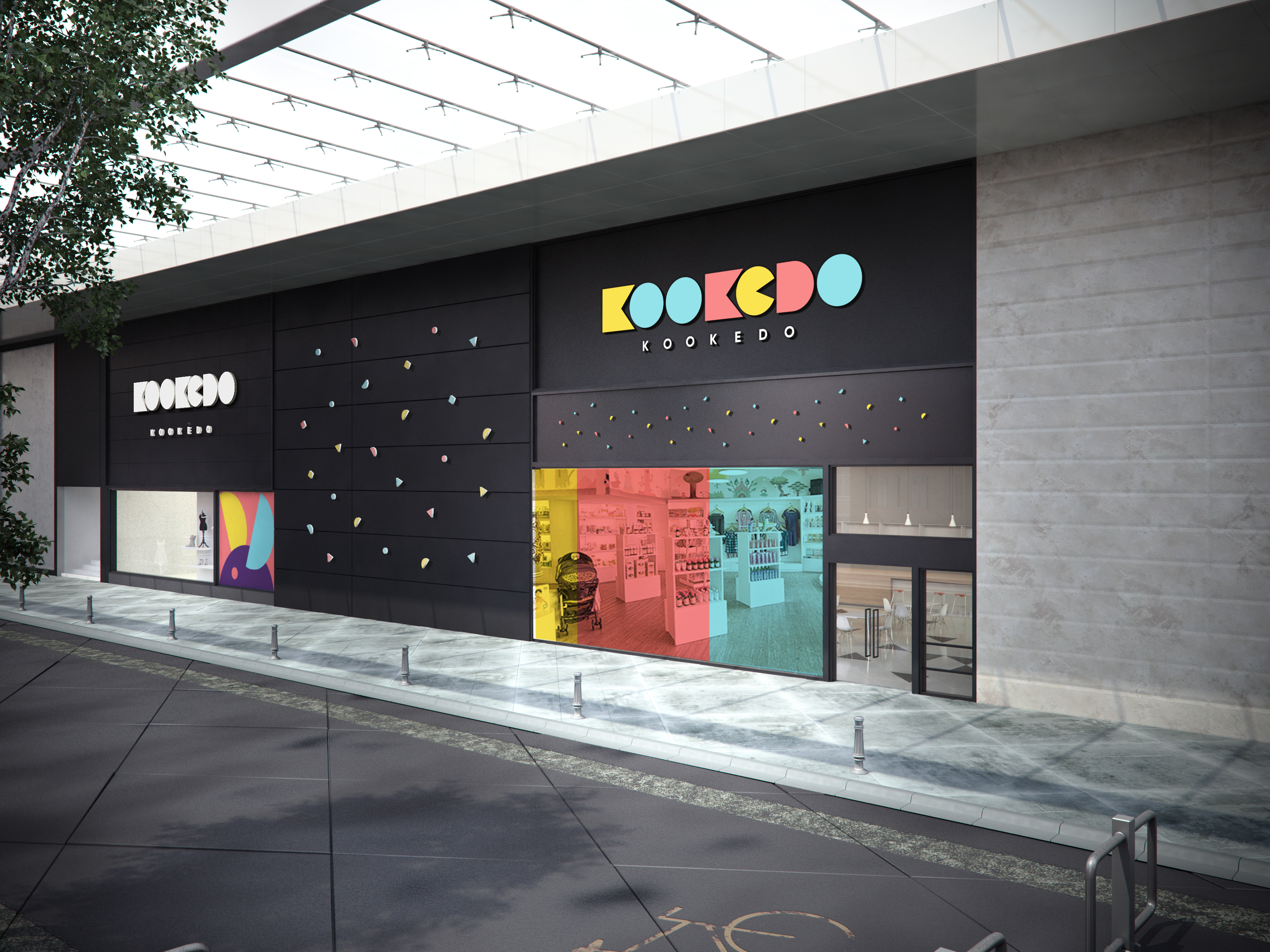 Kookedo concept storefront — colorful wordmark on a black wall with shape pattern